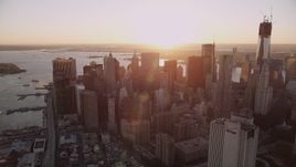 4K aerial stock footage Flying by Lower Manhattan, New York, New York, sunset Aerial Stock Footage | AX93_083