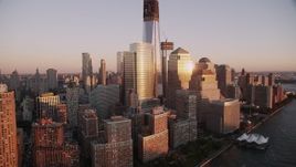 4K aerial stock footage Flying by World Trade Center, Lower Manhattan, skyscrapers, New York, sunset Aerial Stock Footage | AX93_101