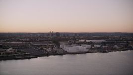4K aerial stock footage Flying by an oil refinery, Newark Bay, Newark, New Jersey, twilight Aerial Stock Footage | AX93_129