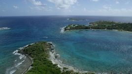 5k stock footage aerial stock footage approach and orbit Little St James Island in sapphire blue waters, St Thomas, Virgin Islands Aerial Stock Footage | AX96_157