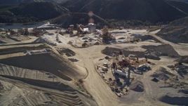 5K aerial stock footage orbit a quarry and industrial equipment, Simi Valley, California Aerial Stock Footage | AXSF01_003