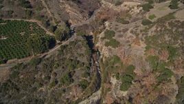 5K aerial stock footage of approaching Ojai Road beside Santa Paula Creek, Santa Paula, California Aerial Stock Footage | AXSF01_009