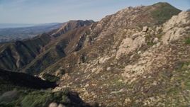 5K aerial stock footage approach jagged mountainsides, reveal Santa Barbara, Santa Ynez Mountains, California Aerial Stock Footage | AXSF01_031
