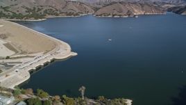 5K aerial stock footage of flying by Lake Cachuma, revealing Bradbury Dam; Lake Cachuma, California Aerial Stock Footage | AXSF01_045