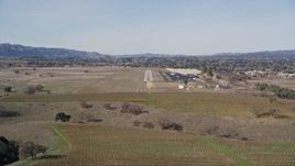 5K aerial stock footage Approaching Santa Ynez Airport for a landing, Santa Ynez, California Aerial Stock Footage | AXSF01_050