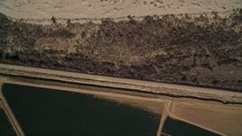 5K aerial stock footage of bird's eye view of fields of crops, reveal dry riverbed, Santa Maria, California Aerial Stock Footage | AXSF02_009