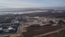 5K aerial stock footage fly away from and around Phillips 66 Company Santa Maria Refinery, Arroyo Grande, California Aerial Stock Footage | AXSF02_019