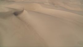 5K aerial stock footage of passing by the sand dunes, Pismo Dunes, California Aerial Stock Footage | AXSF02_022