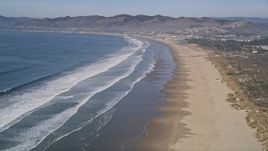 5K aerial stock footage of approaching beachfront homes and Pismo State Beach, Oceano, California Aerial Stock Footage | AXSF02_027