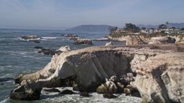 5K aerial stock footage of approaching coastal cliffs, revealing rock formations, Shell Beach, California Aerial Stock Footage | AXSF02_032