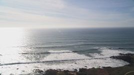 5K aerial stock footage view of the Pacific Ocean from the coastline, Harmony, California Aerial Stock Footage | AXSF03_017