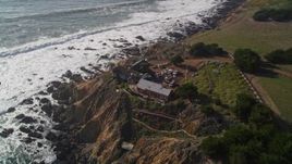 5K aerial stock footage approach house on a cliff overlooking Pacific Ocean, Cambria, California Aerial Stock Footage | AXSF03_022