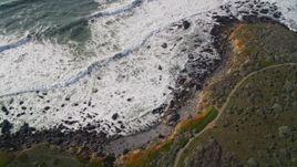 5K aerial stock footage of a bird's eye view of a coastal road and ocean waves, Cambria, California Aerial Stock Footage | AXSF03_027