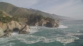 5K aerial stock footage of approaching McWay Falls and coastal cliffs, Big Sur, California Aerial Stock Footage | AXSF03_094