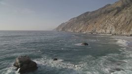 5K aerial stock footage fly over rock formations by coastal cliffs, Big Sur, California Aerial Stock Footage | AXSF03_098