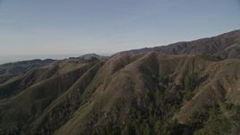 5K aerial stock footage of flying over ridges in mountain landscape, Los Padres National Forest, California Aerial Stock Footage | AXSF03_107