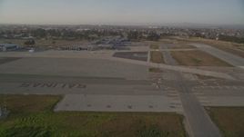 5K aerial stock footage of landing at the Salinas Municipal Airport, Salinas, California Aerial Stock Footage | AXSF03_116