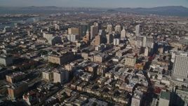 5K aerial stock footage approach and pan across city buildings in Downtown Oakland, California Aerial Stock Footage | AXSF05_003