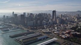 5K aerial stock footage of reverse view of skyscrapers, reveal North Beach and Coit Tower, Downtown San Francisco, California Aerial Stock Footage | AXSF05_018