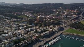 5K aerial stock footage tilt from San Francisco Bay to reveal Yacht Harbor and Palace of Fine Arts, San Francisco, California Aerial Stock Footage | AXSF05_027