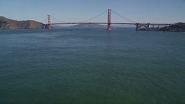 5K aerial stock footage tilt from San Francisco Bay to reveal and approach the Golden Gate Bridge, San Francisco, California Aerial Stock Footage | AXSF05_033