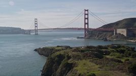 5K aerial stock footage tilting up from San Francisco Bay to reveal Golden Gate Bridge, San Francisco, California Aerial Stock Footage | AXSF05_038