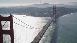 5K aerial stock footage flying by Golden Gate Bridge, reveal the downtown skyline in distance, San Francisco, California Aerial Stock Footage | AXSF05_039