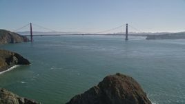 5K aerial stock footage of flying over Marin Headlands revealing Golden Gate Bridge, San Francisco, California Aerial Stock Footage | AXSF05_040