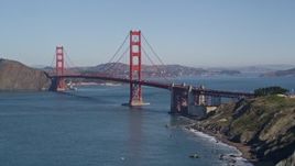 5K aerial stock footage tilt up from San Francisco Bay, reveal and approach Golden Gate Bridge, San Francisco, California Aerial Stock Footage | AXSF05_060