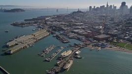 5K aerial stock footage flyby Fisherman's Wharf, approach Pier 39, San Francisco, California Aerial Stock Footage | AXSF05_064