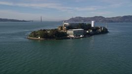 5K aerial stock footage tilt from low flight over San Francisco Bay, revealing Alcatraz, Golden Gate Bridge, California Aerial Stock Footage | AXSF05_067