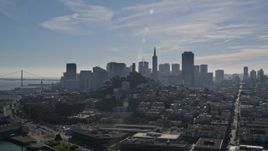 5K aerial stock footage fly over iconic Pier 39, Coit Tower, toward views of skyline, Downtown San Francisco, California Aerial Stock Footage | AXSF05_070