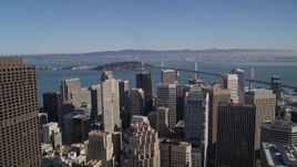 5K aerial stock footage of flying over the city's skyscrapers in Downtown San Francisco toward Bay Bridge, California Aerial Stock Footage | AXSF05_075