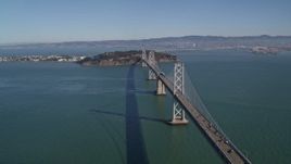 5K aerial stock footage of a view of the Bay Bridge, Yerba Buena Island, Treasure Island in San Francisco, California Aerial Stock Footage | AXSF05_076