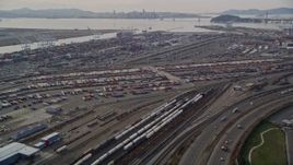 5K aerial stock footage tilt from I-880 freeway, revealing the Port of Oakland, California Aerial Stock Footage | AXSF06_008