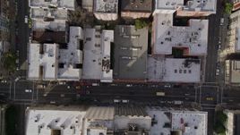 5K aerial stock footage of a bird's eye view of Geary Street and city buildings, Downtown San Francisco, California Aerial Stock Footage | AXSF06_019