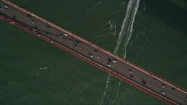 5K aerial stock footage bird's eye view of cars crossing the famous Golden Gate Bridge, San Francisco, California Aerial Stock Footage | AXSF06_044