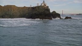 5K aerial stock footage fly over the Point Bonita Lighthouse revealing Golden Gate Bridge, San Francisco, California Aerial Stock Footage | AXSF06_075