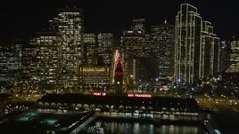 5K aerial stock footage tilt to reveal and ascend over Ferry Building, Downtown San Francisco skyscrapers, and Market Street, California, night Aerial Stock Footage | AXSF07_007