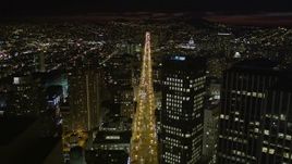 5K aerial stock footage of flying over Market Street past skyscrapers in Downtown San Francisco, California, night Aerial Stock Footage | AXSF07_008