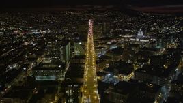 5K aerial stock footage of flying over Market Street through Civic Center near city hall, San Francisco, California, night Aerial Stock Footage | AXSF07_009