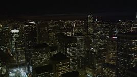 5K aerial stock footage tilt from The Embarcadero, reveal and fly over skyscrapers, Downtown San Francisco, California, night Aerial Stock Footage | AXSF07_016