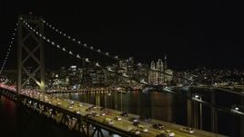 5K aerial stock footage focus on Downtown San Francisco skyline and fly over Bay Bridge, California, night Aerial Stock Footage | AXSF07_032