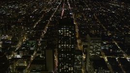 5K aerial stock footage of approaching 555 California Street skyscraper, Downtown San Francisco, California, night Aerial Stock Footage | AXSF07_035