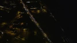 5K aerial stock footage of a bird's eye of Highway 101 freeway traffic through The Presidio, San Francisco, California, night Aerial Stock Footage | AXSF07_037