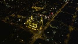 5K aerial stock footage tilt to reveal and orbit St. Ignatius Church in the Inner Richmond District, San Francisco, California, night Aerial Stock Footage | AXSF07_050