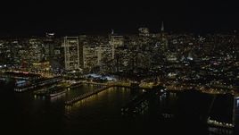 5K aerial stock footage of flying away from the city's skyscrapers, Downtown San Francisco, California, night Aerial Stock Footage | AXSF07_062