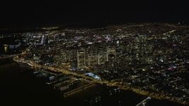 5K aerial stock footage high altitude view of Downtown San Francisco, California, seen from San Francisco Bay at night Aerial Stock Footage | AXSF07_071