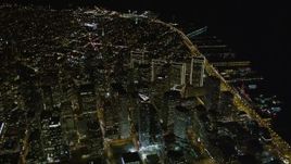 5K aerial stock footage tilt from The Embarcadero to reveal I-80 and Downtown San Francisco, California, night Aerial Stock Footage | AXSF07_076