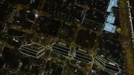 5K aerial stock footage of a bird's eye view of Embarcadero Center skyscrapers, Downtown San Francisco, California, night Aerial Stock Footage | AXSF07_078